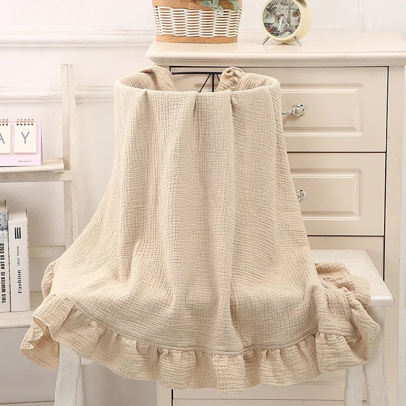 Organic cotton ruffle muslin baby swaddle