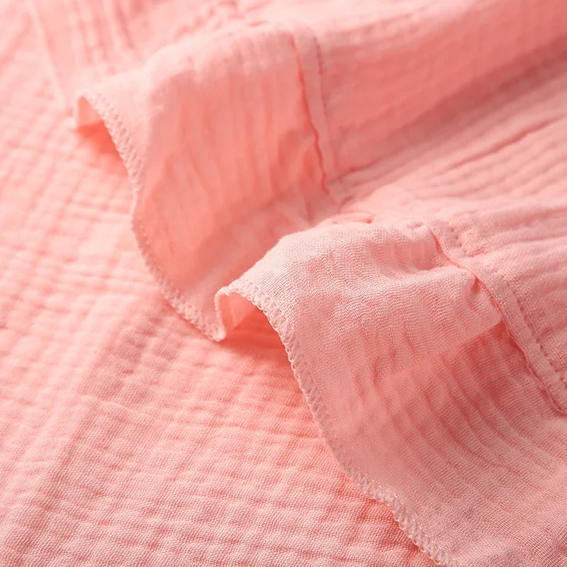 Organic cotton ruffle muslin baby swaddle, view 6
